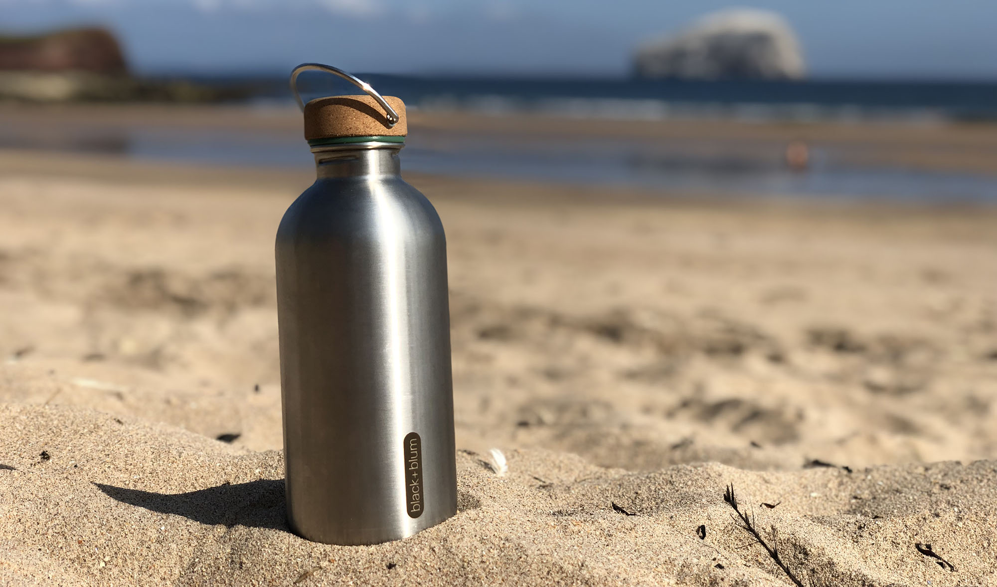 steel-bottle-on-beach